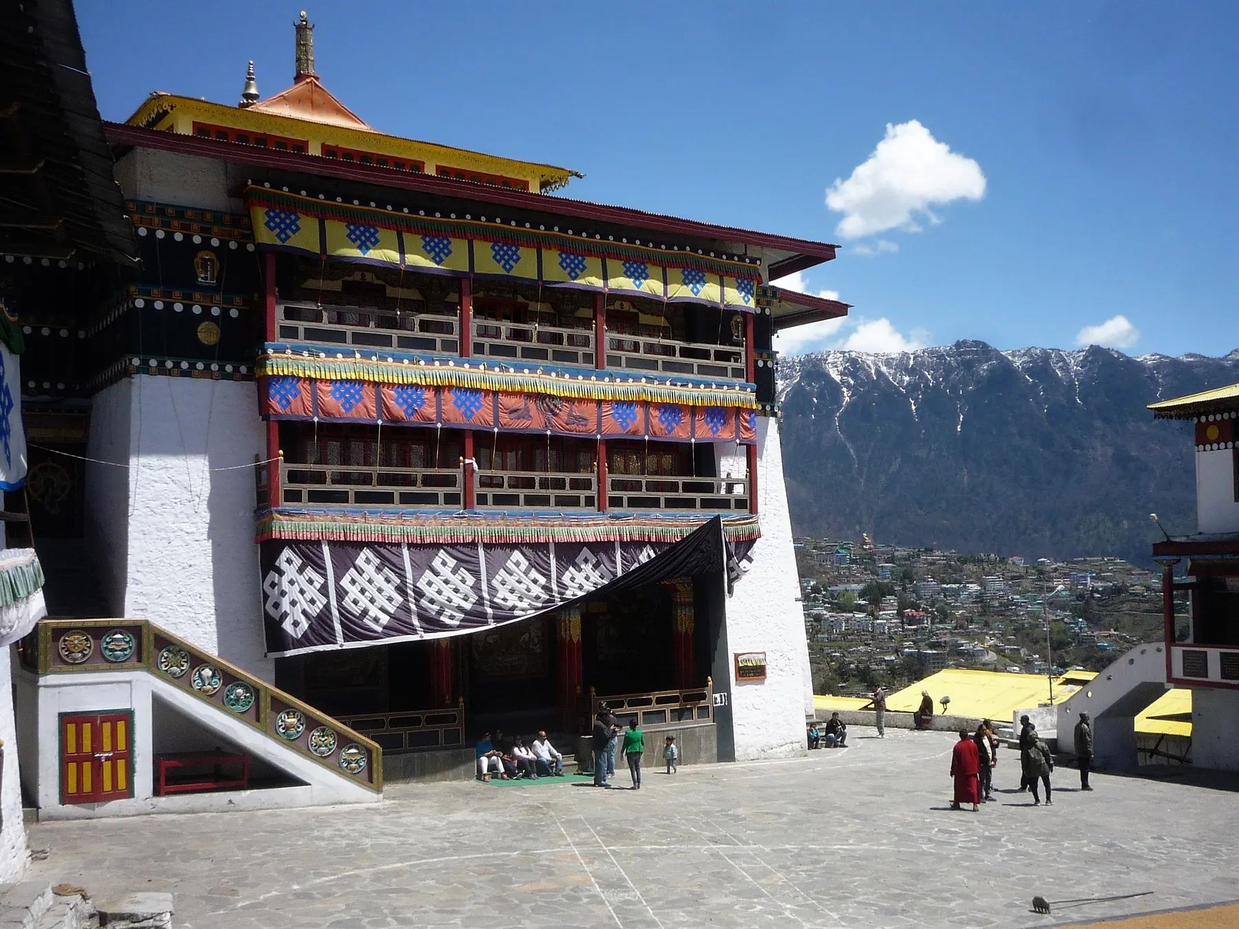 Courtyard of Tawang Monastery with mountains behind