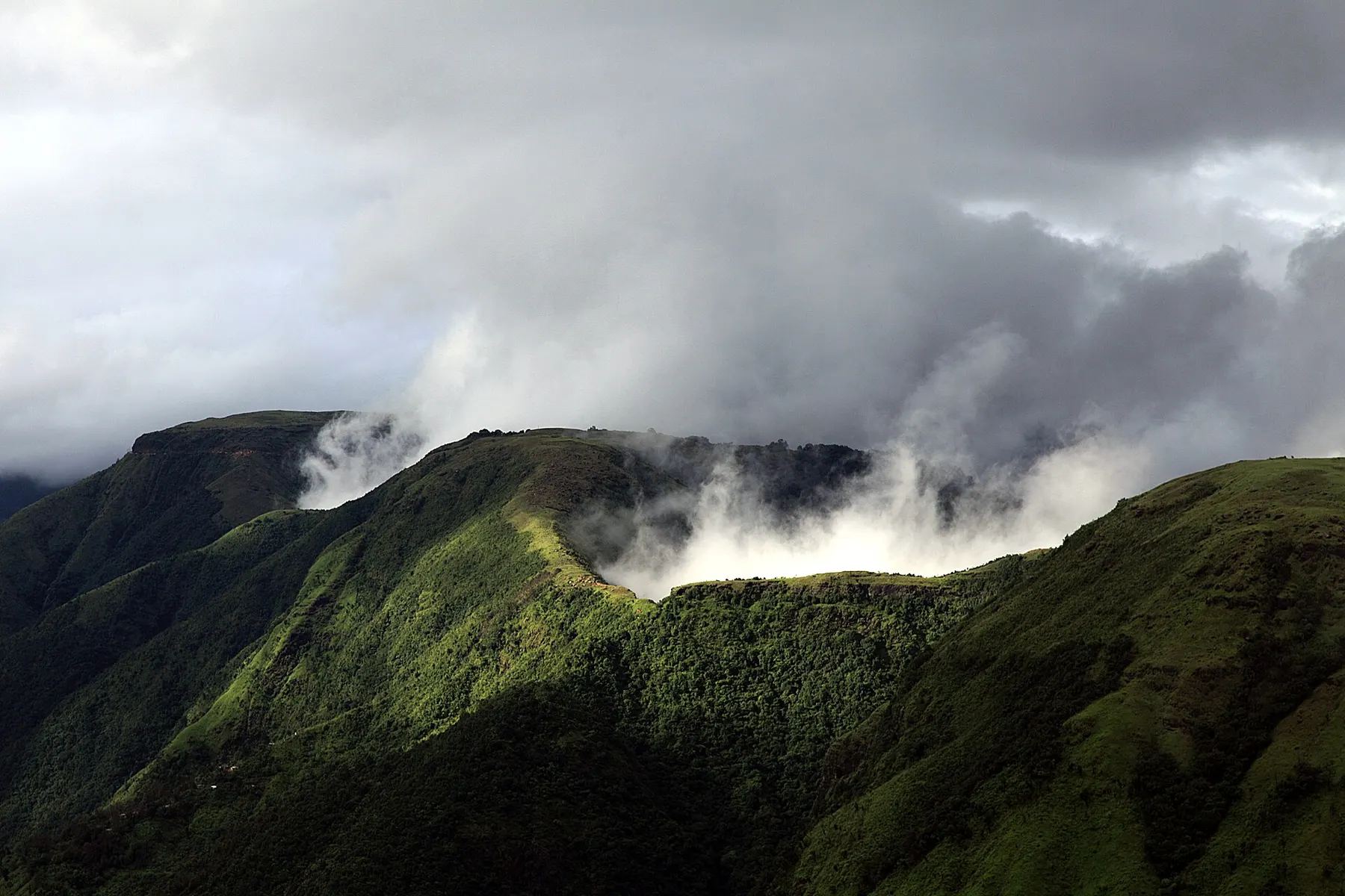 Clouds drifting over the green hills of Laitmawsiang, Meghalaya